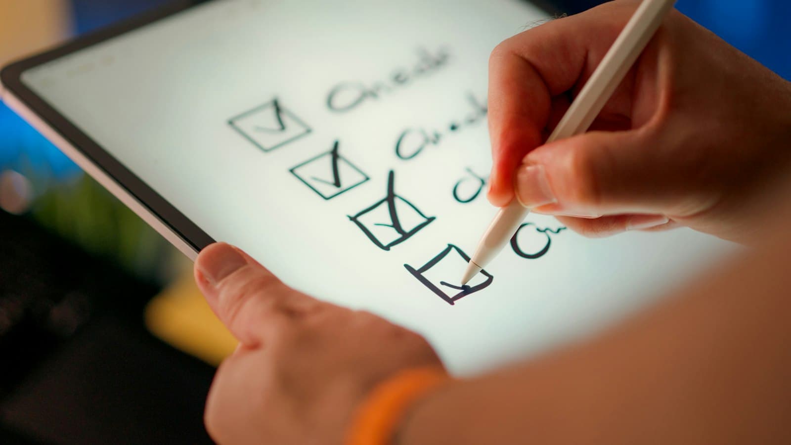 A hand checking off items on a document checklist while rebuilding a visa reapplication