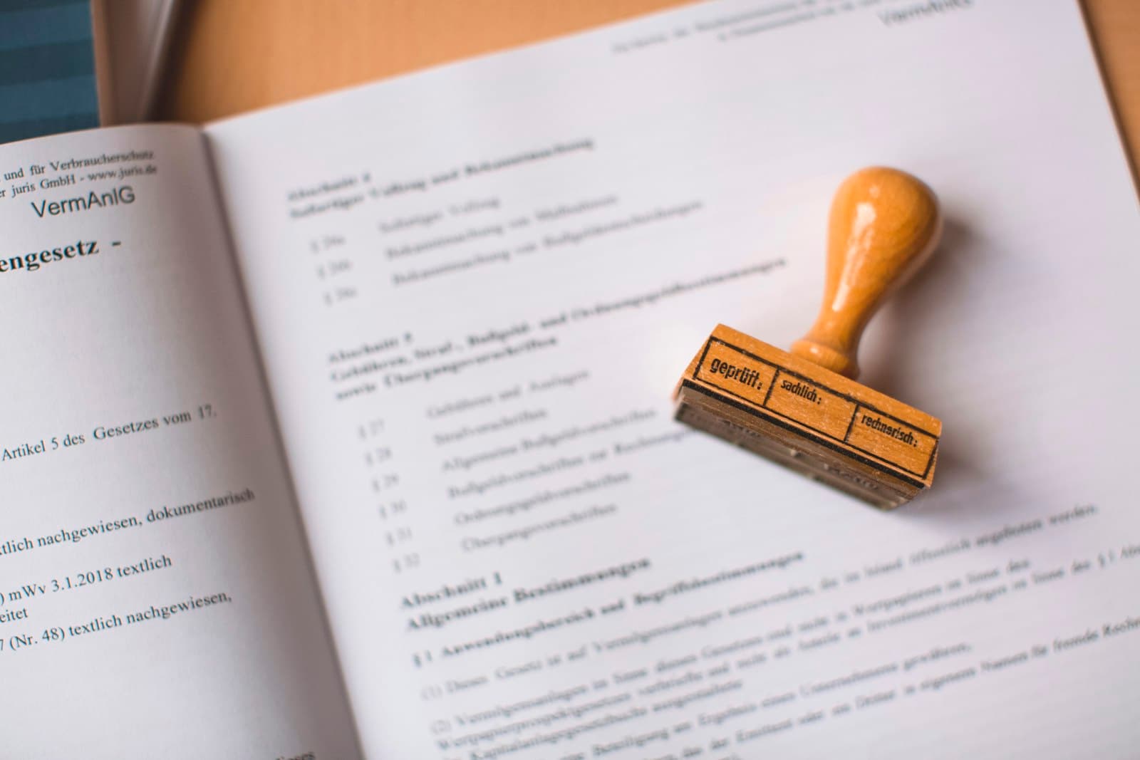 A refusal letter and visa application documents being reviewed on a desk